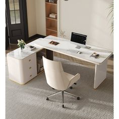 a white desk with a laptop on it and a chair in front of the desk