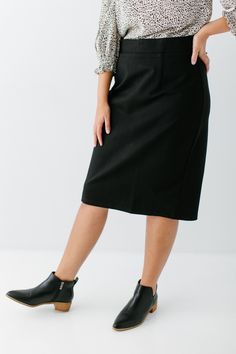 With clean, simple lines and sophisticated style, the 'Anna' is the perfect pencil skirt your closet has been waiting for. Quality fabric, full lining and structured style ensure a modest and flattering fit while an elastic waistband keeps you comfortable. Exclusively designed with you in mind! 68% Rayon 27% Nylon 5% Spandex Machine Wash Cold Gentle Cycle Hang to Dry Low Iron if Needed 1.75" Waistband Fully Lined Model A Height: 5'5" | Wearing Size Small in 23" Length Model B Height 5'8" | Weari Classic Fitted Midi Bottoms, Fitted Classic Midi Length Bottoms, Chic Tailored Knee-length Pencil Skirt, Midi Length Bottoms For Office In Fall, Modern Pencil Skirt For Business Casual, Modern Business Casual Pencil Skirt, Fitted Midi Length Workwear Bottoms, Fitted Midi-length Bottoms For Office, Fall Relaxed Lined Pencil Skirt