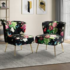 two chairs with floral upholstered on them in front of a rug and window