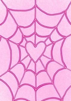 a pink spider web with a heart on it