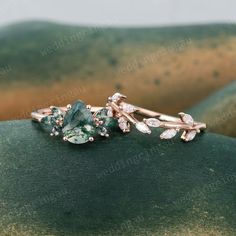 Pear shaped Moss agate Engagement ring set Vintage Rose gold Marquise cut Agate ring Leaf Diamond wedding ring set Women Promise ring set ----------Rings Details ---------- The Engagement Ring: ☆Center stone: Green Moss agate ☆Size: 6*8mm ☆Cut Type: Pear cut ☆Green stones: Moss agate ☆Stone weight: About 0.28ct ☆Band Width: Approx. 1.5mm ☆Band Thickness: Approx. 1.2mm ☆Height of Stone setting: 5.3mm The Wedding Band: ☆Stone: Natural Diamonds or Moissanite ☆Stone weight: about 0.28ct ☆Band Width: Approx. 1.3mm ☆Band Thickness: Approx. 1.2mm The rings are made of Solid gold (14k/18k gold, yellow gold, rose gold are available). All ring size can be made, please contact me if you couldn't find your ring size from the list. ----------Custom Service---------- I accept all kinds of jewelry custom Moss Stone Engagement Ring, Olive Green Wedding Ring, Engagement Rings Lord Of The Rings, Sage Green Promise Rings, Woodsy Engagement Ring, Moss Engagement Ring, Unique Gemstone Engagement Rings, Boho Wedding Ring, Set Rings