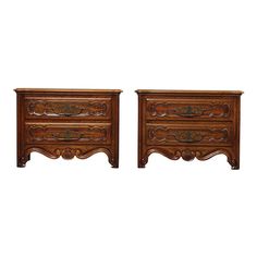 pair of carved wood nightstands on white background