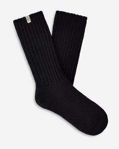 Made from a soft rib knit and crafted with Responsible Cotton, the Tyla Slouchy Crew sock is designed for a slouchier fit. | Slouchy Cotton sock. 97% Cotton/2% Recycled Polyester/1% Elastane. Made from Responsible Cotton. 11 inch height. Soft twill tape with The UGG® Logo on top cuff. Fits shoe size: 5-10. Imported. | UGG® Women's Tyla Slouchy Crew Sock Cotton Blend/Recycled Materials Socks in Tar Ugg Socks, Crew Sock, High Leg Boots, Crew Sweatshirts, Cotton Socks, Womens Uggs, Twill Tape, Socks Women, How To Take Photos