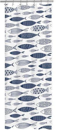 a shower curtain with blue and white fish on the outside, in front of a white background