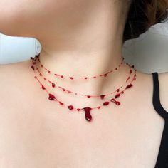 ➡️ [ITEM DESCRIPTION] Handmade blood necklace or bracelet. Both feature a stainless steel lobster clasp. ➡️ [Necklace Styles] --- Single strand blood necklace (choker) 14" Length + 2" extension - max length 16" --- Bracelet 6" + 1.50" Extender - Max Length 7.50" --- Layered blood necklace 14" + 2" Extender - Max Length 16" --- Layered blood necklace 16" + 2" Extender - Max Length 18" All closures and chains are hypoallergenic and nickel / lead free.  ---Custom Orders Accepted --- Please message Blood Jewel Necklace, Blood Bead Necklace, Pearl Blood Necklace, Blood Jewelry Diy, Blood Necklaces, Pomegranate Accessories, Blood Accessories, Vampire Skirt, Blood Drip Necklace