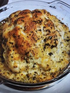 a close up of a casserole in a glass dish on a stove top