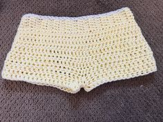 Super cute handmade crochet yellow shorts! Fits best as xs, and should be used as a beach coverup as you can see through the stitches. Crochet Summer Shorts For Beach Season, Summer Beach Shorts With Crochet Details, Summer Crochet Shorts For Beach, Summer Crochet Shorts For Beach Season, Crochet Lace Beach Shorts, Summer Crochet Lace Shorts For Beach, Beach Crochet Lace Shorts, Crochet Beach Shorts For Beach Season, Crochet Shorts For Beach Season