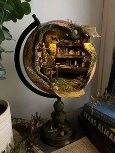 an image of a book shelf in the shape of a globe