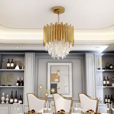 an elegant dining room with white chairs and gold chandelier