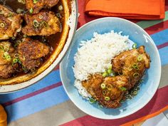 two plates of food on a colorful table cloth