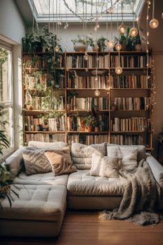 a living room filled with furniture and lots of bookshelves covered in plants on top of them