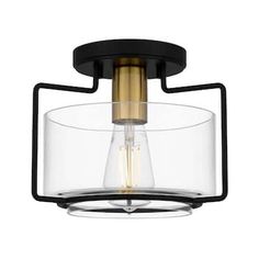 With its mixed metal finishes, this 1-light flush mount from Hampton Bay embodies modern industrial styling. Sleek matte black lines surround a clear glass shade for a unique, geometric outline. Gold accents complete the look, adding a hint of retro shine. Black And Gold Ceiling Light, Black And Gold Flush Mount Light Fixture, Black And Gold Flush Mount Light, Black And Gold Semi Flush Mount Light, Matte Black Flush Mount Light, Light Window Treatments, Black Sunburst Flush Ceiling Light Fixture, Parisian Decor, Interior Lighting Ceiling