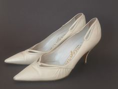 White 1960s Bridal kitten heels, Italian handmade leather shoes Perfect elegant Wedding or First Communion heels Wedding pumps  size: 35 1/2 EU great vintage condition, there is sign of use shown on pictures Please contact me for any information, especially for custom shipping. similar items you can find under: https://www.etsy.com/shop/RosaBoutiqueStudio?ref=hdr_shop_menu&section_id=20946083 and you can always look into my shop for all the others: https://www.etsy.com/shop/RosaBoutiqueStudio Cream Kitten Heels With 4-inch Heel For Evening, Leather Kitten Heels With 4-inch Heel For Wedding, Cream Pointed Toe Kitten Heels For Formal Occasions, Retro Round Toe Heels For Wedding, Retro Almond Toe Wedding Heels, Cream Kitten Heels With Almond Toe For Formal Occasions, Vintage Closed Toe Kitten Heels, Cream Almond Toe Kitten Heels For Formal Events, Cream Almond Toe Kitten Heels For Formal Occasions