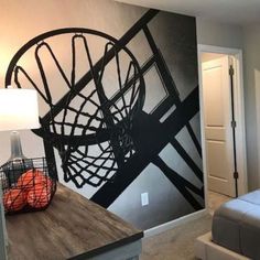 a bedroom with a basketball mural on the wall