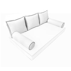 a white couch with four pillows on it