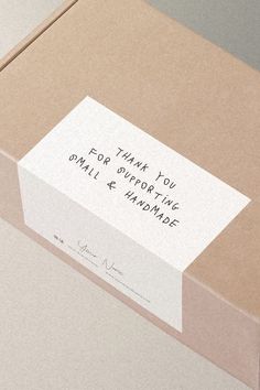 a box with a note attached to it that says thank you for giving someone small & handmade