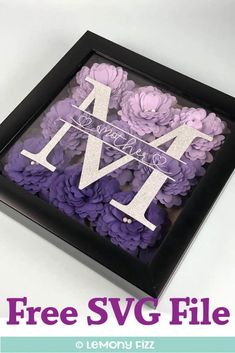 purple flowers in a black frame with the letter m on it and free svg file