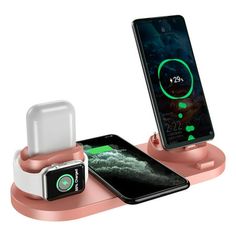 the charging station is connected to an iphone and charger with two devices on it