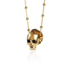 Geometric vampire skull pendant in 18 carat gold vermeil with black onyx eyes and fanged teeth. Kasun pieces are often playful, sometimes quirky, and always beautiful. Made in Thailand 18ct yellow gold plated sterling silver Gold Skull Necklace For Halloween, Gold Skull Jewelry For Party, Yellow Gold Skull Jewelry For Gift, Halloween Skull Shaped Gold Jewelry, Gothic Gold Jewelry For Formal Occasions, Gold Gothic Jewelry For Formal Occasions, Luxury Skull Jewelry For Gifts, Luxury Skull Shaped Jewelry For Gift, Fanged Teeth