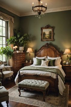 a bedroom with green walls and white bedding has a chandelier hanging from the ceiling