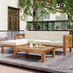 a couch and coffee table on a patio