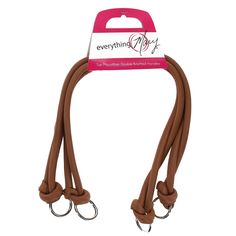 a brown leash with two metal hooks on each end and a white tag that says everything is