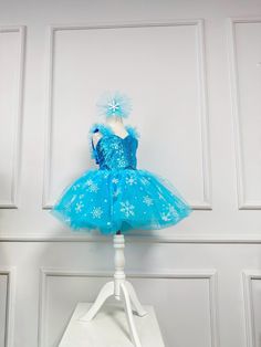 This Elsa Inspired Costume is our own design, and made of high quality satin, luxury sequin  fabric and tulles also there is an under pant under the dress.  The waist of the dress is rubber so that it can be adjusted according to the waist. The straps of the dress can be tied from the back, so you can adjust the dress according to her weight. With this Frozen Toddler Costume your princess will look stuning.. Tis Elsa Tutu Dress is efficient with its refined look.You can be sure that  your princess and friends will  fall in love with this Girl Birthday Costume.. We made this Elsa Birthday Outfit for your princess to look glamorous.. This Frozen Tutu dress is fabulous, gorgeous and perfect for your birthday parties, themed parties, pageants, cake smash photo shootings, cosplay parties and Ha Elsa Birthday Dress, Frozen Birthday Dress Elsa, Elsa Birthday Outfit, Frozen Birthday Dress, Frozen Tutu Dress, Elsa Tutu, Frozen Tutu, Birthday Romper, Frozen Dress