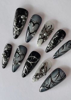 ✴ Hand painted ✴ Reusable ✴ High Quality ✴ Available in different colors, sizes and shapes (on request) IMPORTANT - PLEASE READ BEFORE PURCHASING All sets are made with GEL nail polish. These nails are reusable, if you take it off right. For instruction, please message me Each set comes with 10 handmade press on nails, a mini file, a mini buffer, a cuticle stick, a nail glue, Double Sided Adhesive Tape Glue, Alcohol Pad 1. Measurements Please measure your own nail and find your size from our picture guide. We totally can do custom size as your request, just help us to add your nail size in mm or your nail tips number, and shape, we will process accordingly without any extra charges. Message me if you are unsure about the size/length. We DO NOT accept cancelation for sizing/length problems. Ongles Goth, Fake Nails Designs, Chrome Nail Art, Chrome Nails Designs, Punk Nails, Korean Nails, Goth Nails, Acrylic Press On Nails, Grunge Nails