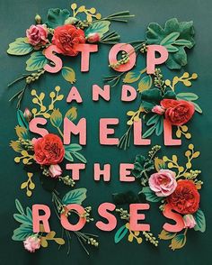 an instagram photo with flowers and the words stop and smell the roses on it