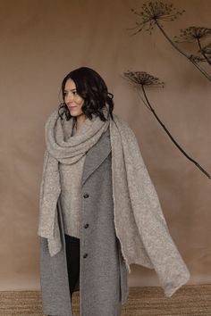 This blanket scarf is made from superfine boucle alpaca yarn. Lightweight, soft and silky, it drapes beautifully, keeps you warm and gives a nice touch to your look thanks to textured structure. Available in 5 colors: beige, light gray, dark gray, charcoal black and brown. The color on the photos is beige and light gray on the last photo. The scarf comes washed, ironed and ready to wear. For more pictures follow us on Instagram on @twillaknitwear COMPOSITION: 89% superfine alpaca/10%nylon SIZE: Oversize Scarf, Alpaca Clothing, Alpaca Shawl, Scarf Blanket, Beige Scarf, Big Scarf, Scarf Wool, Alpaca Scarf, Fast Fashion Brands