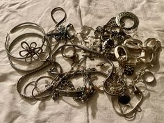 This is a 1/2 pound lot of broken and not, vintage and newer craft jewelry. The majority of these are wearable or for crafts, Silver tones There are necklaces, earrings, bracelets, key rings, broken pieces etc etc. Both vintage and modern. Perfect for your slow stitches or scrapbooking projects. Or other works of art This is NOT a mystery bag or box, so there will be no surprises You get everything in the picture. So study the pictures carefully Various materials such as plastic, metal, beads, etc etc Lots Of Jewelry, Grunge Jewelry, Broken Pieces, Mystery Bag, Retro Earring, Magical Jewelry, Craft Jewelry, Dope Jewelry, Jewelry Lookbook