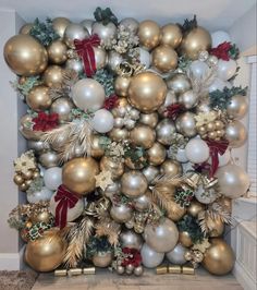 a christmas tree made out of gold and silver ornaments