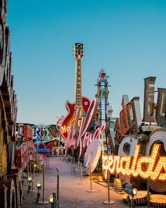 the neon sign for las vegas is lit up