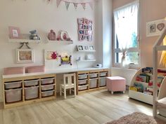 a child's room with lots of toys and decor