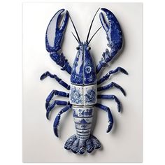 a blue and white ceramic lobster on a white background with an intricately decorated shell