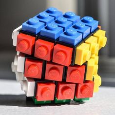 a colorful toy made out of legos sitting on top of a table