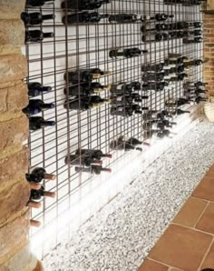 there are many pairs of shoes on display in the building's wine cellars