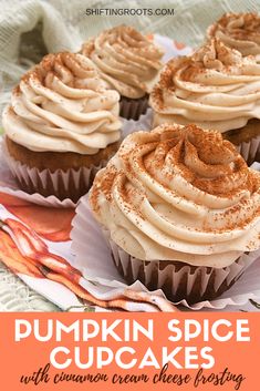 pumpkin spice cupcakes with cinnamon cream cheese frosting are on a white plate