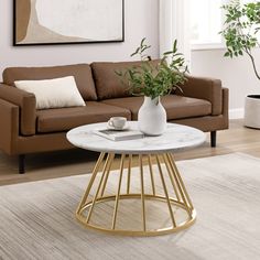 Modern Round Coffee Table with Metal Base Walker Edison White Marble Coffee Table With Metal Base, Modern Round Coffee Table, Table With Metal Base, Travertine Pool Coping, Round Coffee Table Modern, Stylish Coffee Table, Modern Glam, Solid Hardwood Floors, Marble And Gold