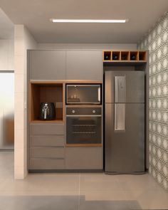 a modern kitchen with stainless steel appliances and cabinets