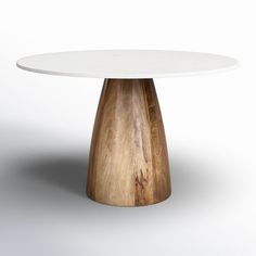 a white table with a wooden base