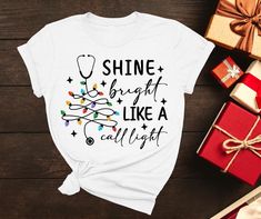 Shine Bright like a Call Light Shirt, Nurse on duty for Christmas Shirt, Holiday Spirit Tee, Christmas Outfit idea, Family Christmas outfit Hello there! Thank you for choosing to support our small business. Customer satisfaction is our top priority. Our shirts are crafted with the finest materials for ultimate comfort and durability. Each shirt is meticulously pressed with premium vinyl using state-of-the-art heat press technology. 𝗛𝗢𝗪 𝗧𝗢 𝗢𝗥𝗗𝗘𝗥 𝟏. Please, Check and Review all Listing Photos. 𝟐. Select Your T-Shirt Size and T-Shirt Color from drop down menus. 𝟑. Choose Your Quantity as much as you want. 𝟒. Click 𝗔𝗗𝗗 𝗧𝗢 𝗖𝗔𝗥𝗧. To order multiple items, return to the list and repeat the steps. HOW TO WASH? Machine wash cold, inside-out, gentle cycle with mild detergent an Nurse On Duty, Family Christmas Outfits, Iron Decor, Top Priority, High Quality T Shirts, White Shirts, A Call, Outfit Idea, Christmas Shirt