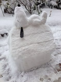 there is a snow sculpture made to look like a bear