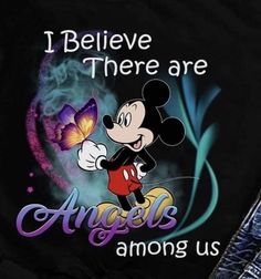 a mickey mouse shirt that says i believe there are angels among us with a butterfly on it