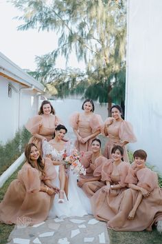 the bridesmaids are posing for a photo together