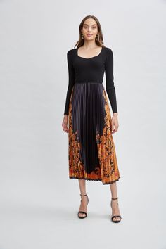 Our effortless Pleated Midi Dress has a distinct modern vibe. The sweetheart neckline viscose sweater knit bodice combines with an artistic scarf print. Definitely poetry in motion! Mixed Media Pleated Print Midi Dress with Long Sleeve Ribbed Knit Mock Neck Bodice Bodice: 60% Polyester, 30% Nylon 10% Spandex; Skirt: 100% Polyester Runs True to Size Model is 5'9" and wearing size S Measurements: 50"L Shoulder to Hem (approx. measurement for size S) Imported Style #: ETR44366 Tahari Dress, Print Midi Dress, Long Sleeve Short Dress, Pleated Midi Dress, Modern Vibe, Printed Midi Dress, Sweater Knit, Knit Jacket, Knit Sweater Cardigan