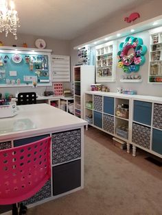 an organized craft room with lots of storage