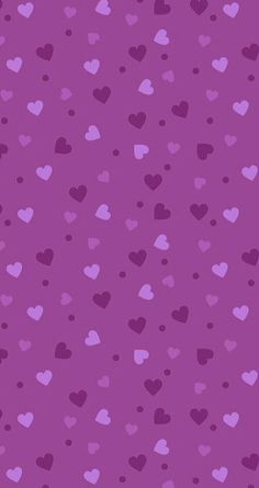 purple hearts wallpaper with lots of small pink hearts on the bottom right corner,