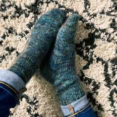 "A super cozy pair of worsted weight socks perfect to keeps those toes warm on cool mornings. MATERIALS 1 skein Red Sock Blue Sock Yarn, Comfort Sock DK (MC) 1 skein Red Sock Blue Sock Yarn, Wistful (CC2) GAUGE 24 sts and 36 rounds = 4\" in St st, after blocking NEEDLES US 5 (3.75 mm) double pointed needles OR 9 inch circulars OR equivalent needles for magic loop FINISHED MEASUREMENTS  Adult Small (Medium, Large) 6.75 (7.25, 8) inches circumference TOOLS Removable stitch markers, tapestry needle SKILL LEVEL Easy ✔ DISCLAIMER: All knitting patterns and crochet patterns are instant-download digital files. No patterns are shipped. Resell finished product with pattern credit. © Ashley Ratnam; All rights reserved" Sock Knitting Pattern, Socks Knitting Pattern, Socks Knitting, Sock Knitting, Magic Loop, Blue Socks, Sock Knitting Patterns, Double Pointed Needles, Knitted Slippers