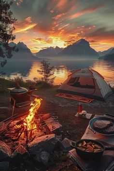 a camp site with a fire and camping gear